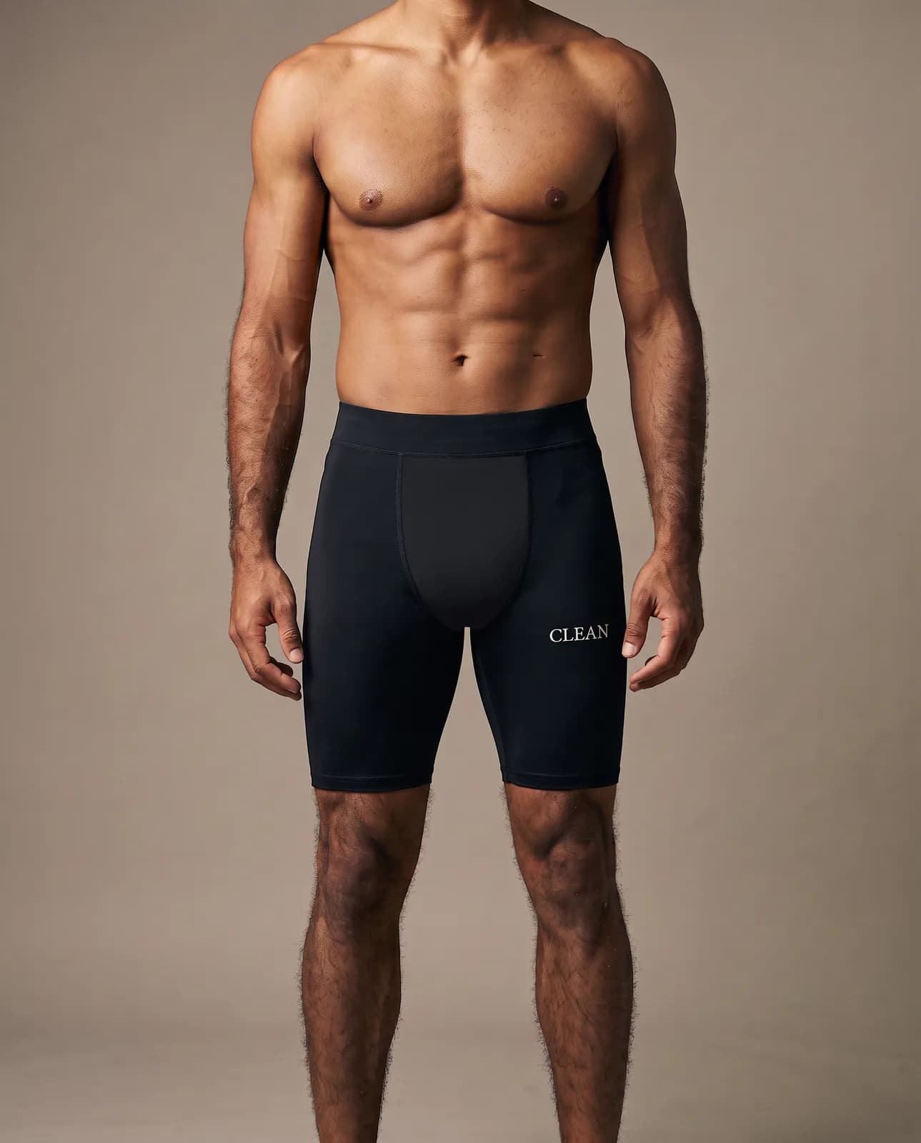 Model wearing the compression shorts, front view from the chest to the shins.